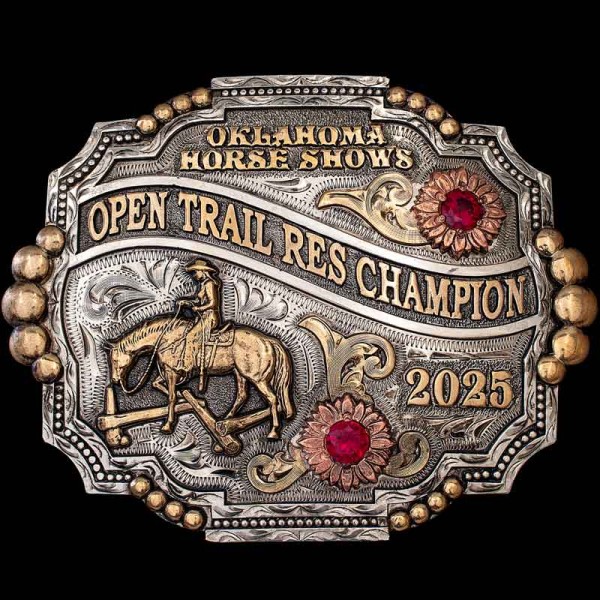 "This is the buckle you've been looking for! Our El Reno Belt Buckle is a timeless, one-of-a-kind piece. Handcrafted on a German Silver base, it features a two-toned bead edge in a non-traditional shape. This buckle screams detail, from the hand-engr